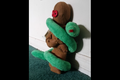 Doll shown from side angle to show piece fully constructed for 360 degree view